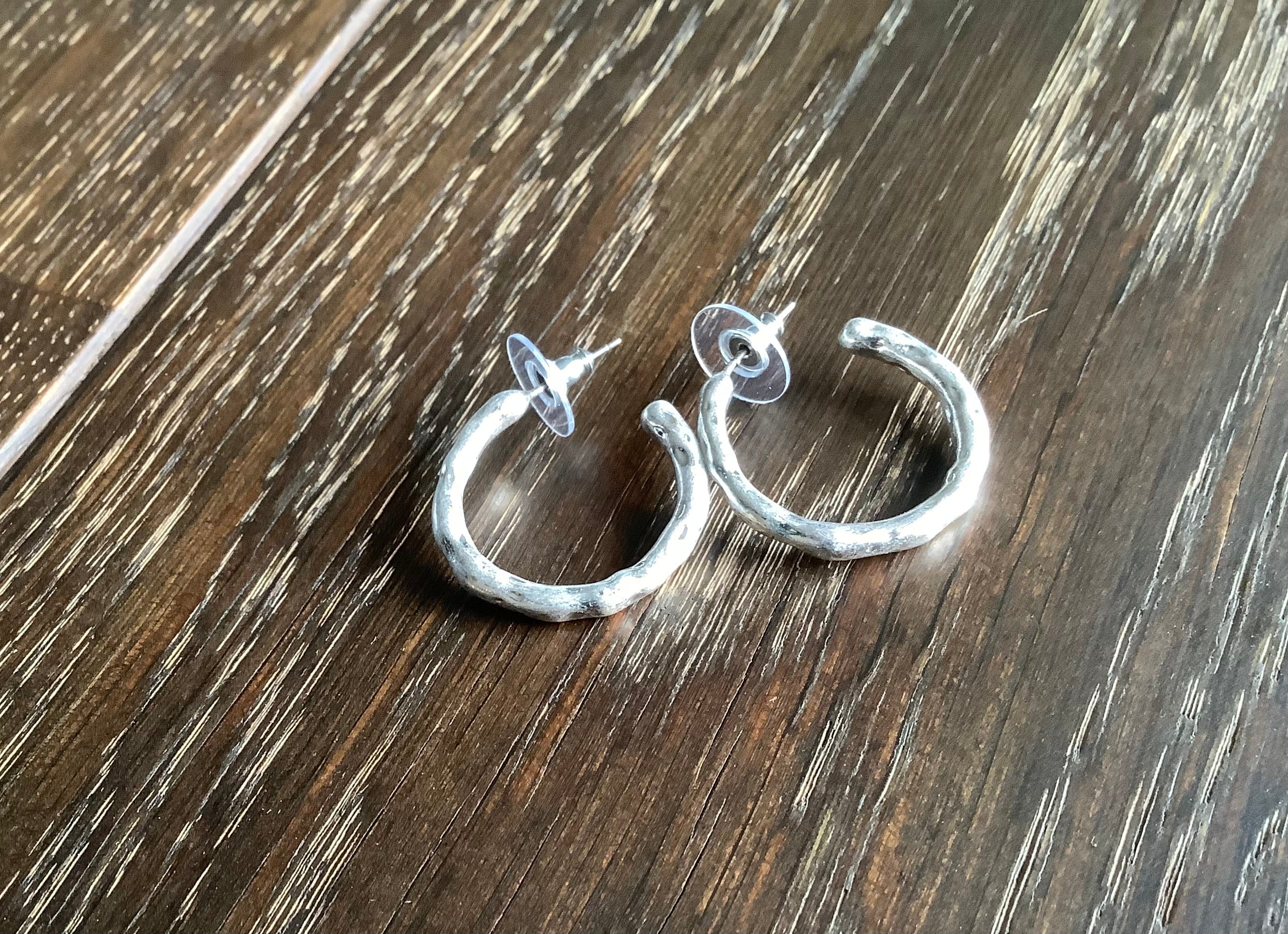 Silver plate worn textured C hoop earrings