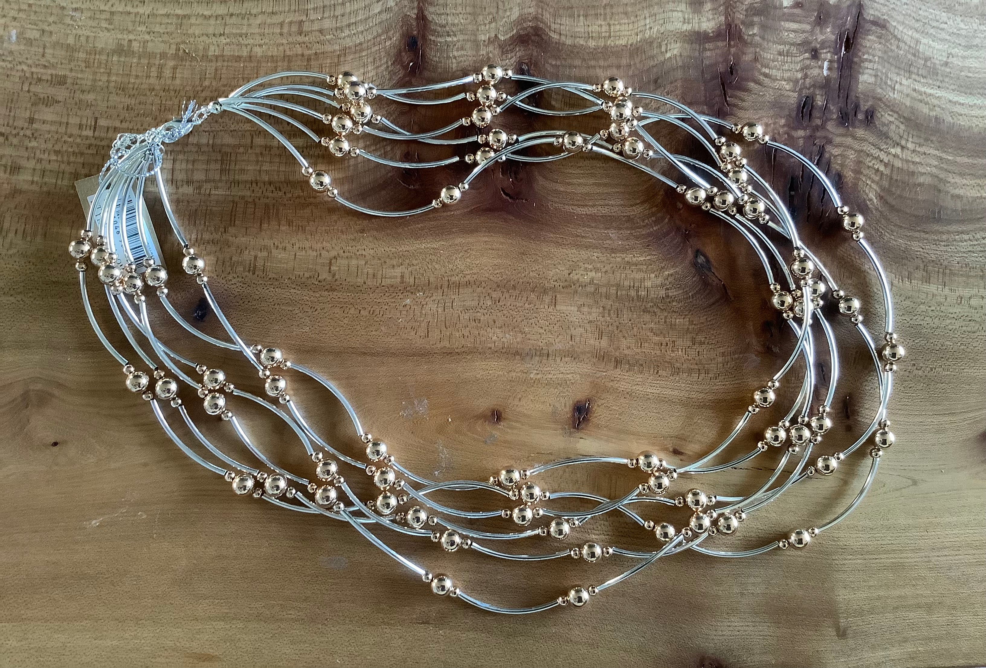 Gold and silver coloured strand necklace