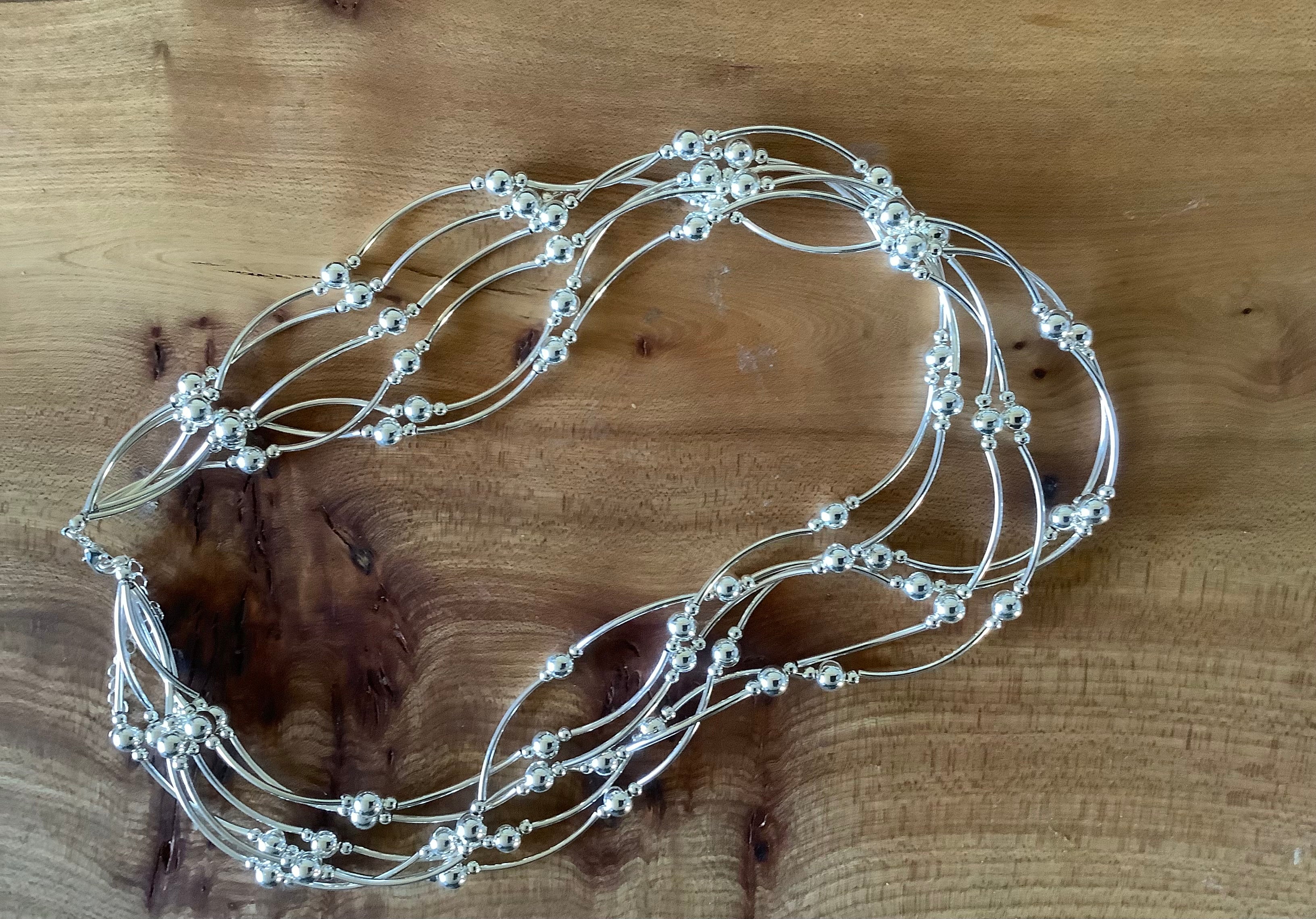 Silver strand necklace