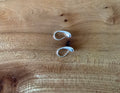 Silver coloured earrings