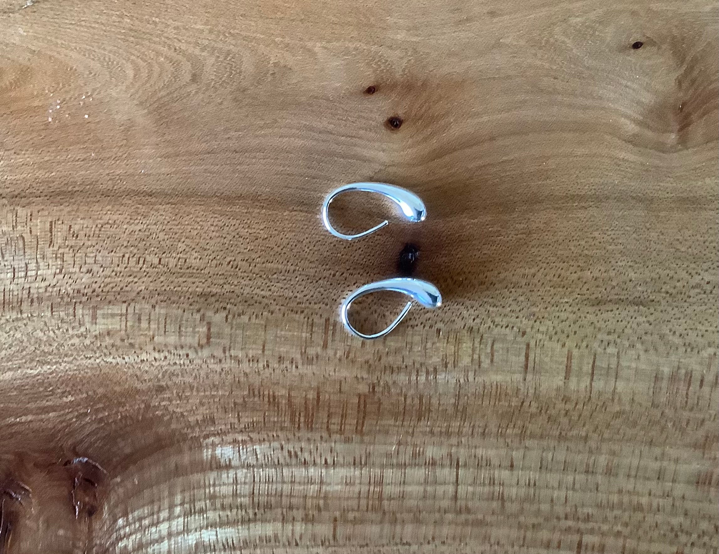 Silver coloured earrings