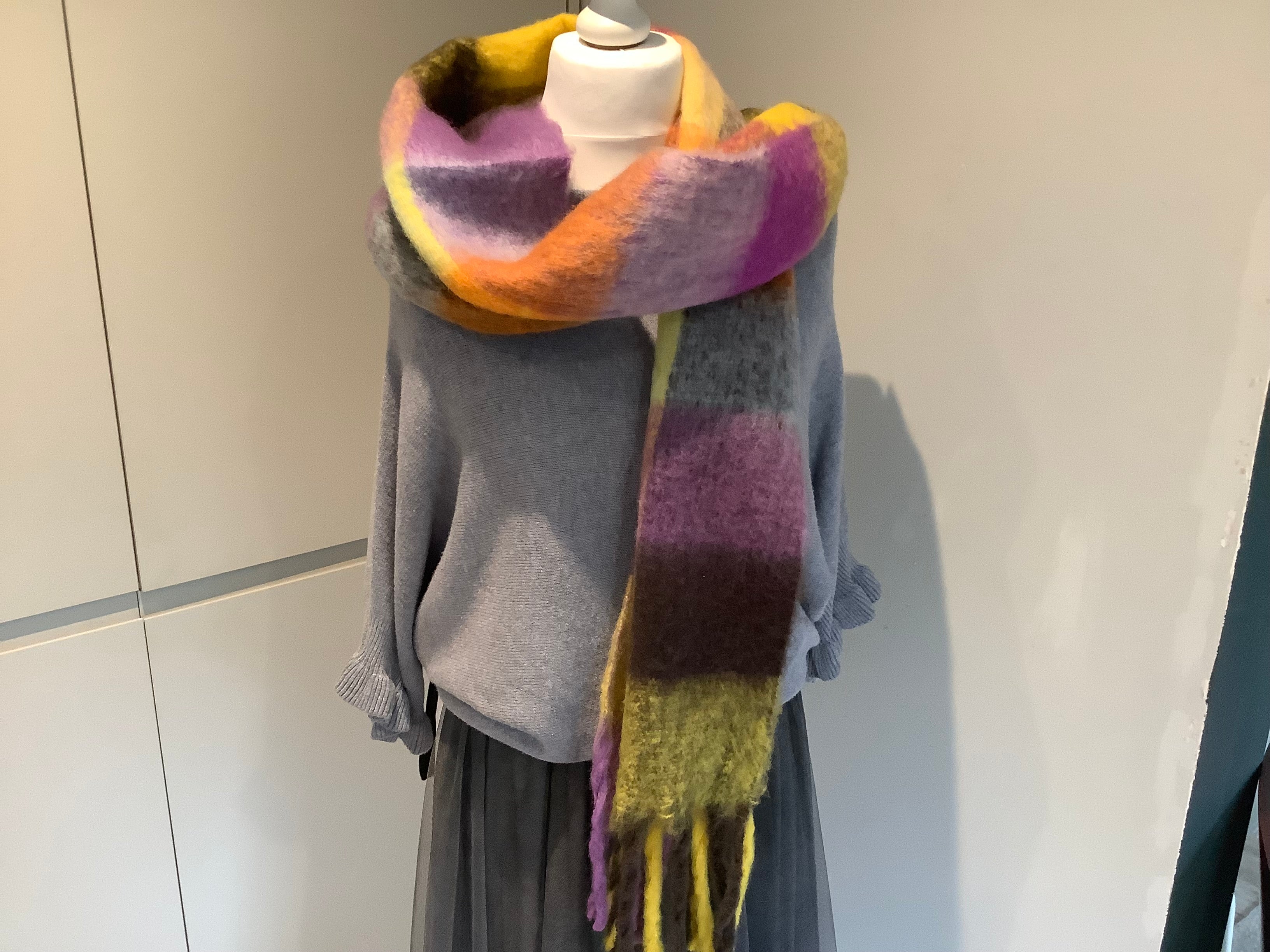 Brightly coloured scarf with heather tones